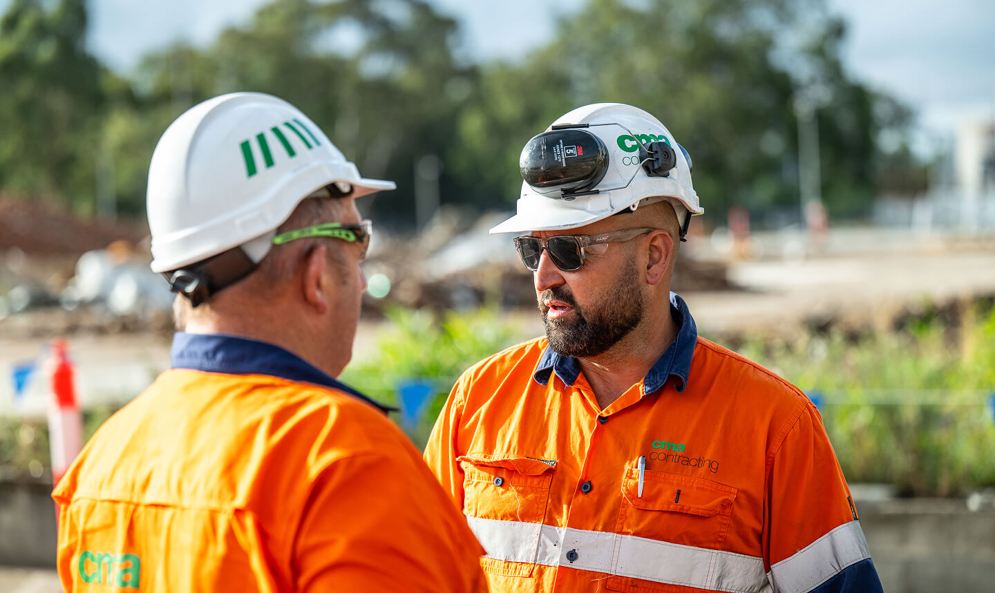 Two men in hardhats